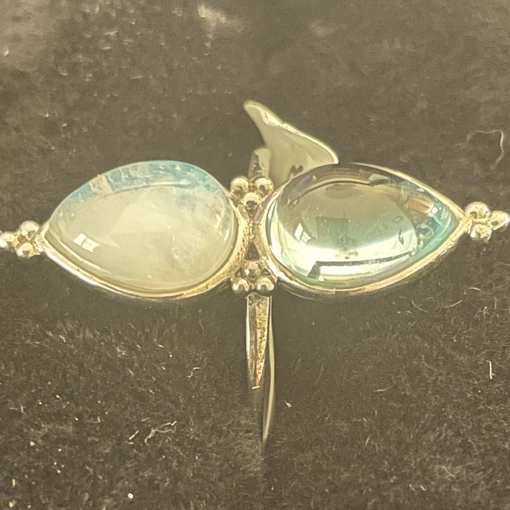 Sterling silver blue topaz/moonstone ring.